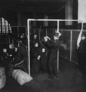 Ellis Island Prints: U.S. inspectors examining eyes of immigrants at Ellis Island, in New York Harbor