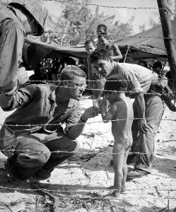 Barbed Wire Prints: U.S. Marine Civil Affairs on Saipan set up camps for refugees