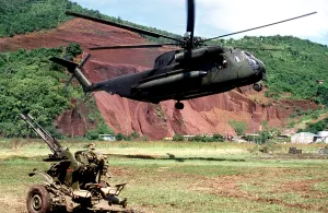Proxy Wars Prints: U.S. Marine Corps helicopter hovers near a Soviet anti-aircraft weapon during the U