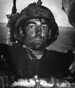 Tired Prints: U.S. Marine after two days and nights on the beach of Eniwetok Island