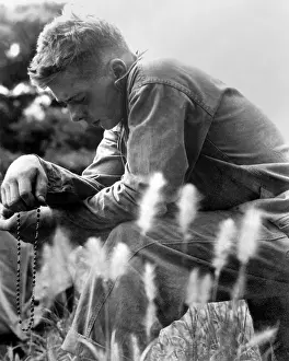 Meditation Prints: U.S. Marine in prayer for the safety of himself and his comrades