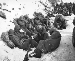 Frozen Prints: U.S. Marines catch a few moments rest during their withdrawal from the Chosin Reservoir