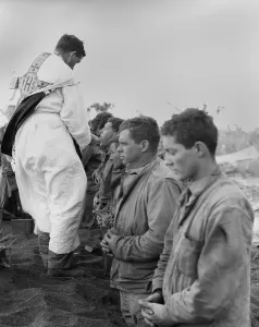 Communion Prints: U.S. Marines and a Chaplain celebrate Catholic Communion during the Battle of Iwo Jima