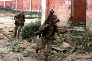 Defenses Prints: U.S. Marines running from sniper fire in Mogadishu Somalia during the troubled U