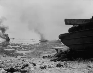 Under Fire Prints: U.S. Marines take shelter as amphibious vehicles burn on the beach