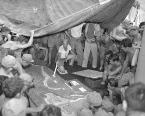 Tactics Prints: U.S. Marines study a relief map on Guam before their July 21