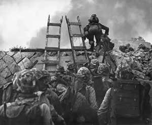 Seawall Prints: U.S. Marines use scaling ladders to storm ashore at Red Beach in the amphibious invasion of Inchon