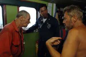Ukraine Prints: U.S. Navy Corpsman treats crew members from Belize-flagged Ukrainian ship FAINA after their release by Somali pirates
