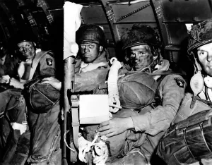 Paratroopers Prints: U.S. paratroopers with blackened faces in a C-47 transport aircraft on D-Day
