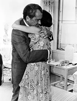 Father And Daughter Prints: U.S. President Richard Nixon hugging his daughter Julie Nixon Eisenhower after informing her that he must resign