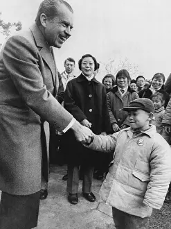 China Prints: U.S. President Richard Nixon shaking hands with a young boy in Hangzhou