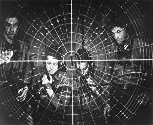 Electronics Prints: U.S. sailors at a state of the art radar scope during World War 2