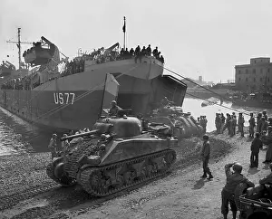 Mediterranean Sea Prints: U.S. Sherman tanks leave a landing ship in Anzio harbor