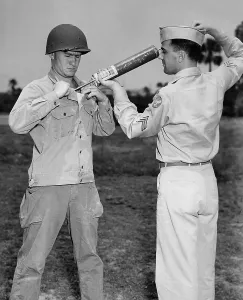 Environment Prints: A U.S. soldier applying the insecticide DDT to kill mosquitoes that spreads malaria and lice that carry typhus