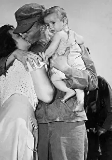 Leave Taking Prints: U.S. soldier bidding his wife and 8-month-old son goodbye as he leaves for Korea in 1950