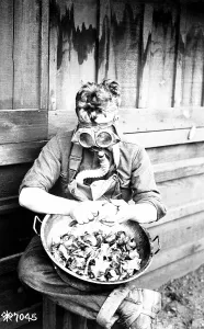 December Prints: U.S. soldier putting his respirator to good use while peeling onions