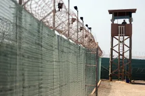 Cuba Prints: U.S. Soldier stands watch in a guard tower at Camp Delta in Guantanamo Bay Naval Base Cuba June 8 2010
