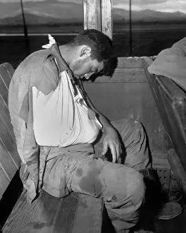 Tired Prints: U.S. soldier wounded by enemy mortar fire on front lines during in South Korea