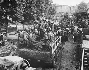 Trucks Prints: U.S. Soldiers move up to the firing line in Korea on July 18