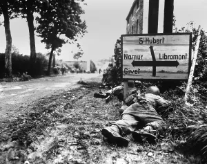 Defensive Prints: U.S. Soldiers pinned down by German small arms fire in the Belgian town of Libin