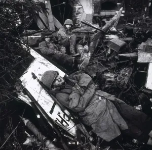 War 2 Prints: U.S. soldiers resting among ruins of building