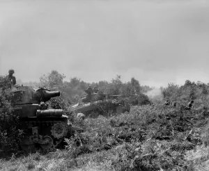 Tanks Prints: Three U.S tanks firing on German positions in the Battle of the Falaise Pocket