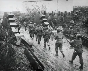 War 2 Prints: U.S. troops moving through dragon's teeth of the West Wall (Siegfried Line) fortifications