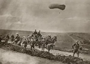 Balloons Prints: U.S. WW1 engineers repairing shelled roads as observation balloon hovers near. 1918