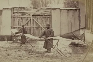 Artisans Prints: Using pre-industrial methods, two men prepare a warp for cotton cloth in Taskestan ca