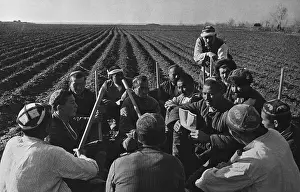 Eastern Europe Prints: Uzbek collective farmers discussing work of spring sowing in the USSR