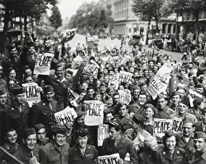 Wacs Prints: V-J Day in Paris, France. GI's and WACs wave the STARS AND STRIPES headline