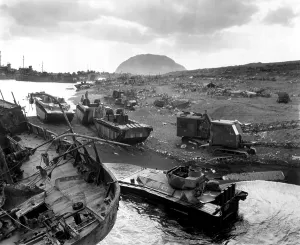Island Prints: Vehicles of war knocked out on the black sands of the volcanic island of Iwo Jima