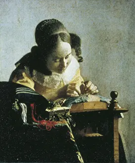 VERMEER, Johannes (1632-1675). The Lacemaker. mid. 17th c. Baroque art. Oil on canvas. FRANCE. Paris. Louvre Museum. AISA/Everett Collection**US SALES ONLY**