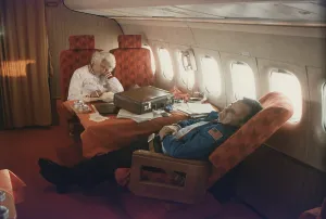 Vice Presidents Prints: Vice President and Barbara Bush sleeping on Air Force II during the 1984 Presidential Campaign