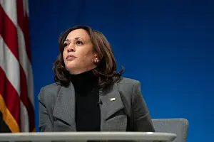 Asian American Prints: Vice President Kamala Harris listens during a virtual tour of the Community Vaccination Center at State Farm Stadium