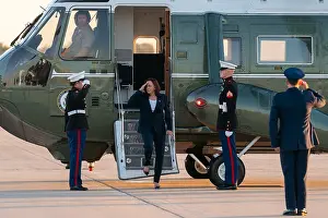 Harris Prints: Vice President Kamala Harris salutes US Marines as she leaves Marine Two at Joint Base Andrews