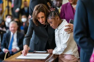 Asian American Prints: Vice President Kamala Harris shows Gianna Floyd
