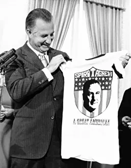 Spiro Prints: Vice President Spiro Agnew admires a T-shirt presented him