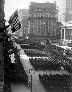 Armistice Prints: Victory Parade in honor of returned fighters passing the Public Library