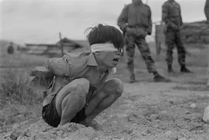 Terror Prints: Viet Cong prisoner of war. A terrified VC prisoner awaiting interrogation unit of special forces A-109 Thuong Duc
