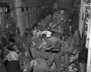 Helicopters Prints: Vietnam War. 101st Airborne Division soldiers an a helicopter enroute to Phi Troung Air Base for a search