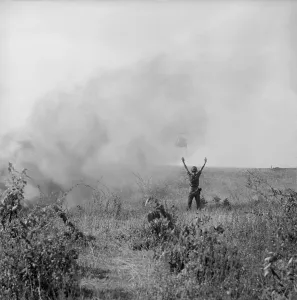 Republic Of Vietnam Prints: Vietnam War. US Army soldier directs a helicopter to pick up soldiers injured after a parachute drop in South Vietnam