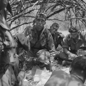 Republic Of Vietnam Prints: Vietnam War. A First Lieutenant of US Army Recondos gives instructions to his squad leaders in Phan Rang