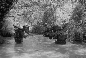 Marsh Prints: Vietnam War. US Marines move through water in Quang Tri Province during Operation Hastings