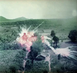 Mission Prints: Vietnam War, Napalm bombs explode on Viet Cong structures south of Saigon in the Republic of Vietnam