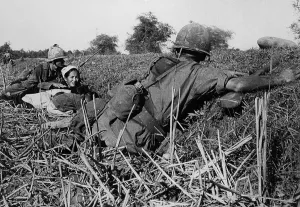 Republic Of Vietnam Prints: Vietnam War. Soldiers of the 1st Infantry Division protect a refugee mother