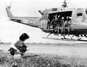 Vietnamese Prints: Vietnam War, South Vietnamese soldiers from the 9th ARVN Division wave as they depart the village of Cai Be