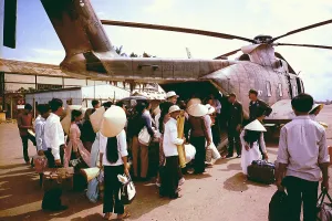 Vietnam Prints: Vietnam War, South Vietnamese villagers board an Air Force CH-3C helicopter for evacuation to another village as U