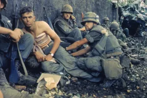 Bandages Prints: Vietnam War-Tet Offensive. A medic treats a US Marine's wounds during Operation Hue City