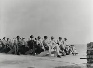 Atomic Prints: VIPs view the DOG shot, an 81 kiloton atomic detonation wearing safety goggles